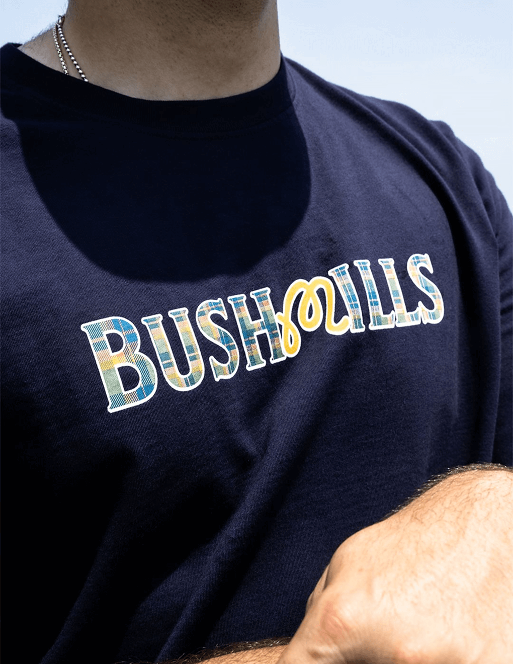 Bushmills x Malbon logo on navy tee.