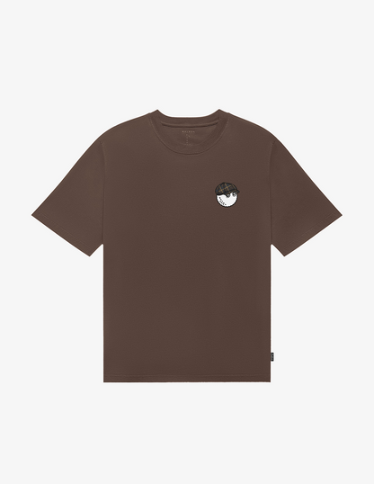 Front of the brown Bushmills X Malbon Tee.