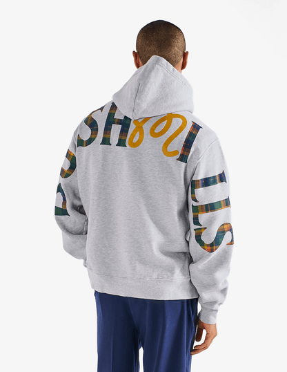 Back view of Bushmills x Malbon gray hoodie on a male model. 