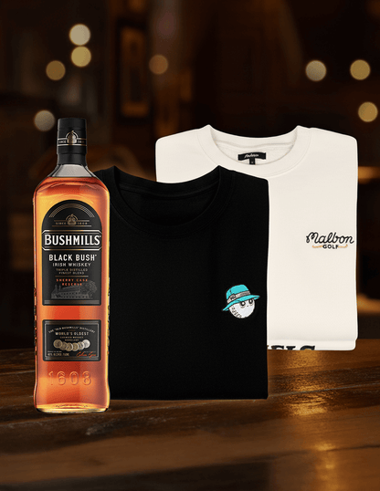 Bushmills Clubhouse Gift Set, complete with Bushmills Black Bush bottle, white Bushmills x Malbon crewneck, and the Bushmills x Malbon Black Tee.