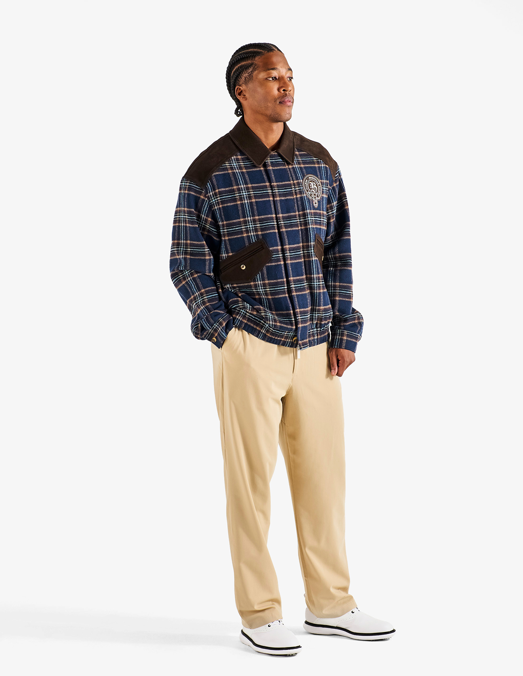 Side view of Bushmills X Malbon Wool & Leather Jacket on a model with khaki pants.
